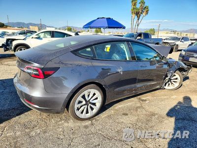 Trzecie zdjęcie samochodu z tyłu: 2022 TESLA MODEL 3 VIN:5YJ3E1EA5NF208373 - miniatura
