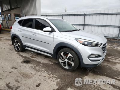 Czwarte zdjęcie samochodu z boku: 2017 HYUNDAI TUCSON LIMITED VIN:KM8J3CA25HU582819 - miniatura