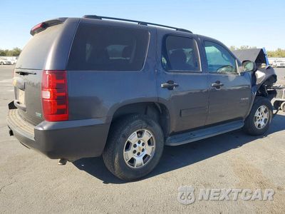 Trzecie zdjęcie samochodu z tyłu: 2010 CHEVROLET TAHOE C1500 LS VIN:1GNUCAE07AR112595 - miniatura