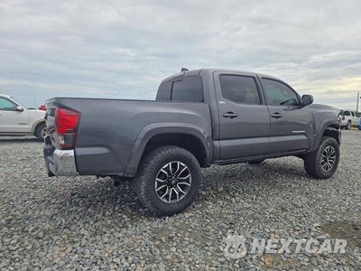 Trzecie zdjęcie samochodu z tyłu: 2021 TOYOTA TACOMA SR5 V6 VIN:3TMAZ5CNXMM149906 - miniatura