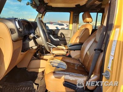 Zdjęcie 7 z 13 samochodu: 2014 JEEP WRANGLER UNLIMITED SAHARA VIN:1C4BJWEG5EL110854 - miniatura