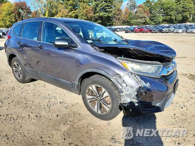 Czwarte zdjęcie samochodu z boku: 2017 HONDA CR-V LX VIN:5J6RW6H37HL000119 - miniatura