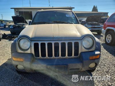 Piąte zdjęcie samochodu w środku: 2003 JEEP LIBERTY SPORT VIN:1J4GL48K13W675368 - miniatura