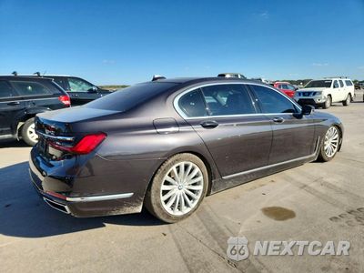 Trzecie zdjęcie samochodu z tyłu: 2022 BMW 740 I VIN:WBA7T2C05NCH34183 - miniatura
