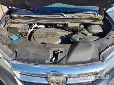 Zdjęcie 12 z 14 samochodu: 2019 HONDA PILOT TOURING VIN:5FNYF5H61KB012184 - miniatura