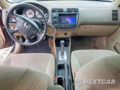 Zdjęcie 8 z 12 samochodu: 2002 HONDA CIVIC LX VIN:2HGES16562H505484 - miniatura