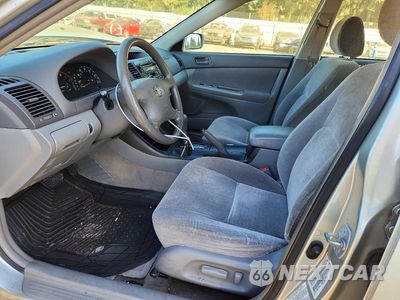 Zdjęcie 7 z 12 samochodu: 2003 TOYOTA CAMRY LE VIN:JTDBE32K730181404 - miniatura