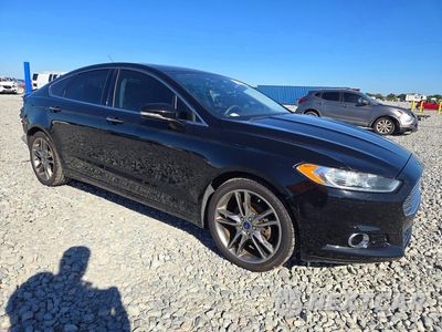 Czwarte zdjęcie samochodu z boku: 2016 FORD FUSION TITANIUM VIN:3FA6P0K94GR255204 - miniatura