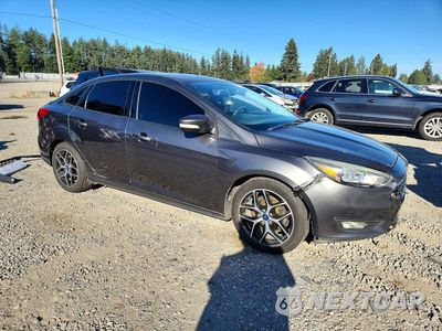 Czwarte zdjęcie samochodu z boku: 2017 FORD FOCUS SEL VIN:1FADP3H22HL248982 - miniatura