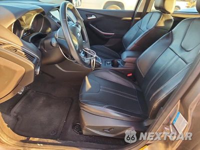 Zdjęcie 7 z 12 samochodu: 2014 FORD FOCUS TITANIUM VIN:1FADP3N22EL381001 - miniatura