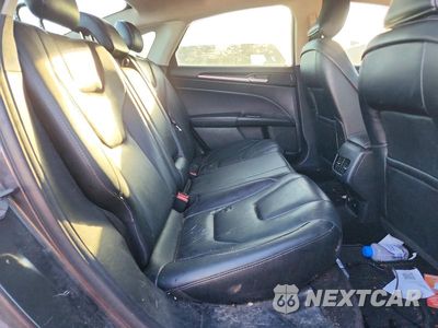 Zdjęcie 10 z 12 samochodu: 2017 FORD FUSION TITANIUM PHEV VIN:3FA6P0SU2HR209845 - miniatura