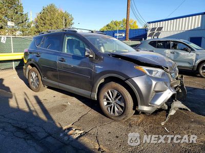 Czwarte zdjęcie samochodu z boku: 2018 TOYOTA RAV4 HYBRID LE VIN:JTMRJREV0JD235571 - miniatura