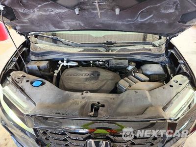 Zdjęcie 12 z 13 samochodu: 2022 HONDA PASSPORT ELITE VIN:5FNYF8H08NB004150 - miniatura