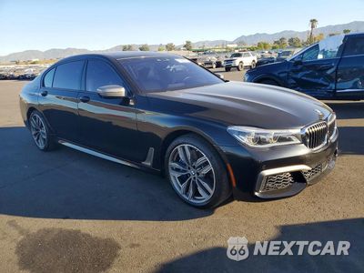 Czwarte zdjęcie samochodu z boku: 2019 BMW M760 XI VIN:WBA7H6C59KG615235 - miniatura