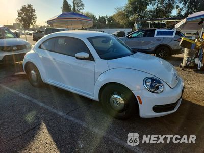Czwarte zdjęcie samochodu z boku: 2016 VOLKSWAGEN BEETLE SE VIN:3VWJ17AT4GM602911 - miniatura