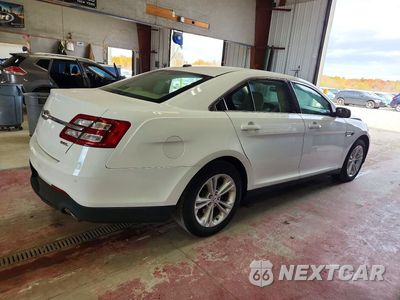 Trzecie zdjęcie samochodu z tyłu: 2015 FORD TAURUS SEL VIN:1FAHP2E85FG164620 - miniatura