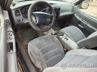 Zdjęcie 8 z 13 samochodu: 1999 FORD EXPLORER VIN:1FMYU24EXXUA14043 - miniatura