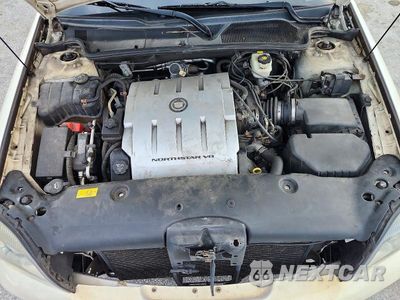 Zdjęcie 11 z 12 samochodu: 2004 CADILLAC DEVILLE VIN:1G6KD54Y44U238087 - miniatura