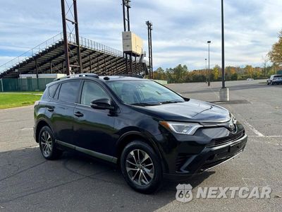 Czwarte zdjęcie samochodu z boku: 2018 TOYOTA RAV4 HYBRID LE VIN:JTMRJREV5JD212545 - miniatura