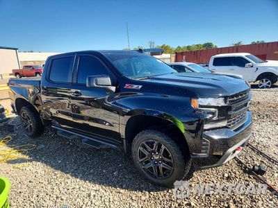 Czwarte zdjęcie samochodu z boku: 2021 CHEVROLET SILVERADO K1500 LT TRAIL BOSS VIN:3GCPYFEL7MG356265 - miniatura