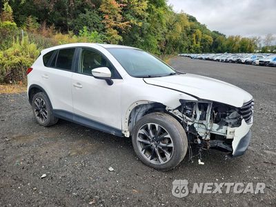 Czwarte zdjęcie samochodu z boku: 2016 MAZDA CX-5 GT VIN:JM3KE4DY5G0627571 - miniatura