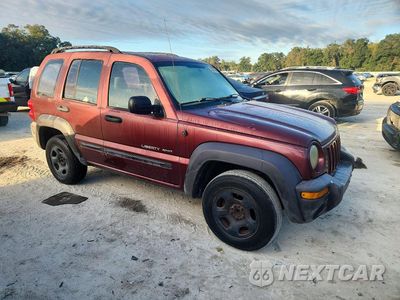 Czwarte zdjęcie samochodu z boku: 2003 JEEP LIBERTY SPORT VIN:1J4GK48K93W622176 - miniatura
