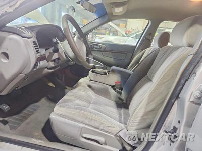 Zdjęcie 7 z 12 samochodu: 2001 CHEVROLET IMPALA VIN:2G1WF52E719236160 - miniatura