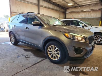 Czwarte zdjęcie samochodu z boku: 2016 KIA SORENTO LX V6 VIN:5XYPGDA58GG174608 - miniatura
