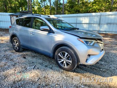 Czwarte zdjęcie samochodu z boku: 2018 TOYOTA RAV4 XLE VIN:JTMRFREV6JJ228286 - miniatura