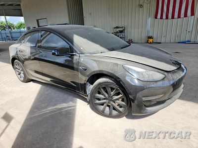 Czwarte zdjęcie samochodu z boku: 2023 TESLA MODEL 3 VIN:5YJ3E1EA9PF458119 - miniatura