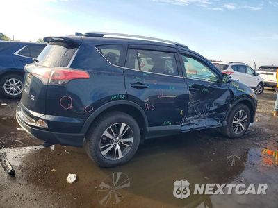 Trzecie zdjęcie samochodu z tyłu: 2018 TOYOTA RAV4 XLE VIN:JTMRFREVXJJ732811 - miniatura