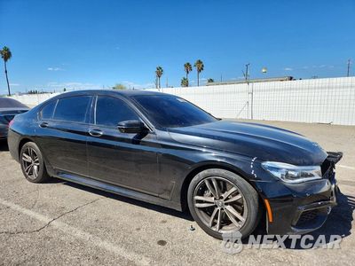 Czwarte zdjęcie samochodu z boku: 2016 BMW 750 XI VIN:WBA7F2C54GG417006 - miniatura
