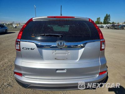 Zdjęcie 6 z 13 samochodu: 2016 HONDA CR-V LX VIN:2HKRM3H35GH502785 - miniatura