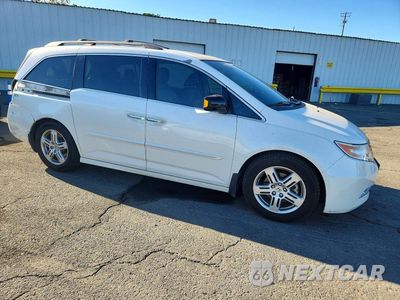 Czwarte zdjęcie samochodu z boku: 2012 HONDA ODYSSEY TOURING VIN:5FNRL5H9XCB009728 - miniatura