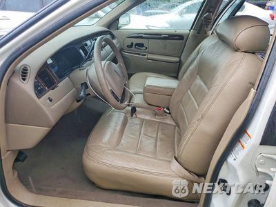 Zdjęcie 7 z 12 samochodu: 2000 LINCOLN TOWN CAR EXECUTIVE VIN:1LNHM81W9YY869911 - miniatura
