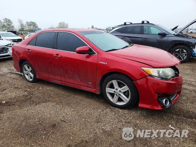 Czwarte zdjęcie samochodu z boku: 2014 TOYOTA CAMRY HYBRID SE VIN:4T1BD1FK7EU126721 - miniatura