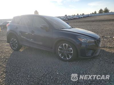 Czwarte zdjęcie samochodu z boku: 2016 MAZDA CX-5 GT VIN:JM3KE4DYXG0797490 - miniatura