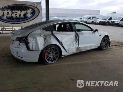 Trzecie zdjęcie samochodu z tyłu: 2019 TESLA MODEL 3 VIN:5YJ3E1EB6KF388175 - miniatura
