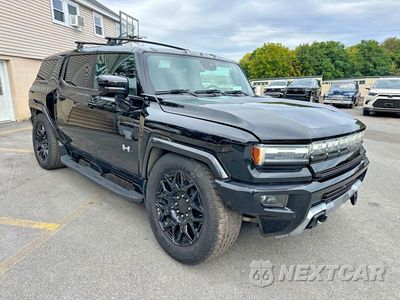 Czwarte zdjęcie samochodu z boku: 2024 GMC HUMMER SUV 2X VIN:1GKB0NDE8RU113233 - miniatura