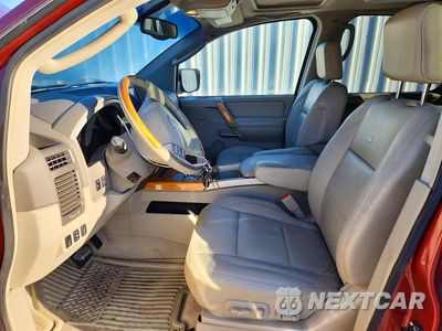 Zdjęcie 7 z 13 samochodu: 2004 INFINITI QX56 BASE VIN:5N3AA08C44N809450 - miniatura