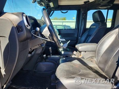 Zdjęcie 7 z 14 samochodu: 2014 JEEP WRANGLER UNLIMITED SAHARA VIN:1C4BJWEG4EL247719 - miniatura