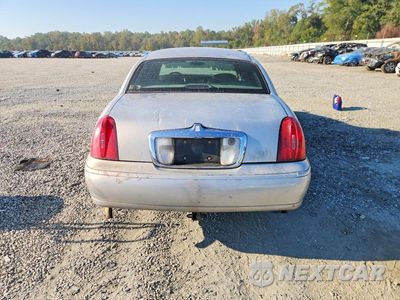 Zdjęcie 6 z 12 samochodu: 1999 LINCOLN TOWN CAR SIGNATURE VIN:1LNHM82W7XY672958 - miniatura