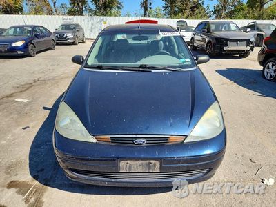 Piąte zdjęcie samochodu w środku: 2004 FORD FOCUS LX VIN:1FAFP33P44W201800 - miniatura