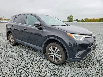 Czwarte zdjęcie samochodu z boku: 2018 TOYOTA RAV4 LE VIN:2T3BFREV1JW771404 - miniatura