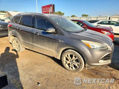 Czwarte zdjęcie samochodu z boku: 2014 FORD ESCAPE TITANIUM VIN:1FMCU9JX7EUA99946 - miniatura