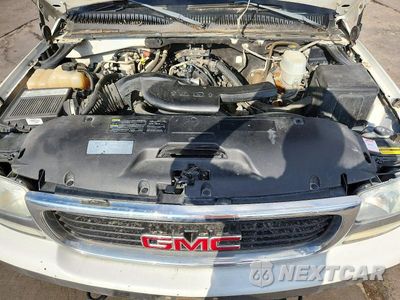 Zdjęcie 12 z 14 samochodu: 2004 GMC YUKON XL K1500 VIN:3GKFK16Z94G264680 - miniatura