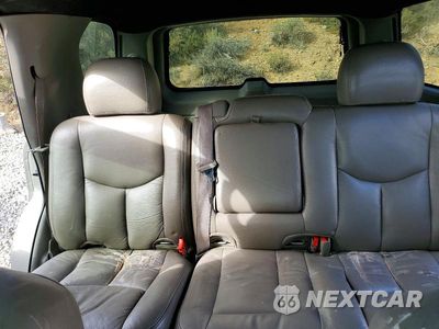 Zdjęcie 10 z 13 samochodu: 2004 GMC YUKON VIN:1GKEC13V04R182590 - miniatura