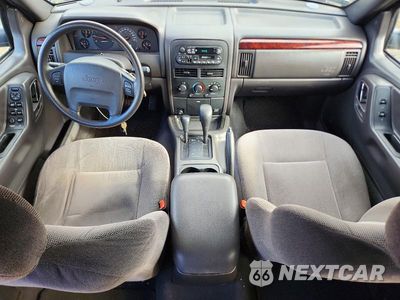 Zdjęcie 8 z 11 samochodu: 2000 JEEP GRAND CHEROKEE LAREDO VIN:1J4GW48S6YC122439 - miniatura