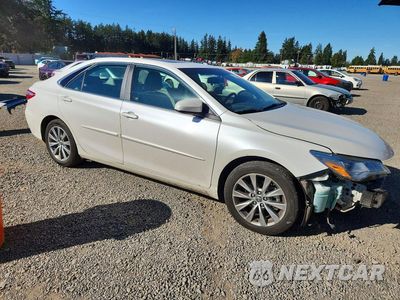Czwarte zdjęcie samochodu z boku: 2015 TOYOTA CAMRY XLE V6 VIN:4T1BK1FK8FU560010 - miniatura