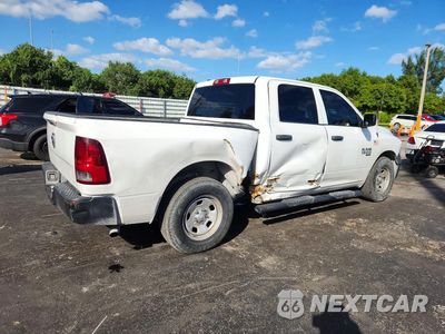 Trzecie zdjęcie samochodu z tyłu: 2021 RAM 1500 CLASSIC TRADESMAN VIN:1C6RR6KG0MS560533 - miniatura
